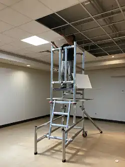 Commercial site maintenance using a professional LOYAL tower / podium steps